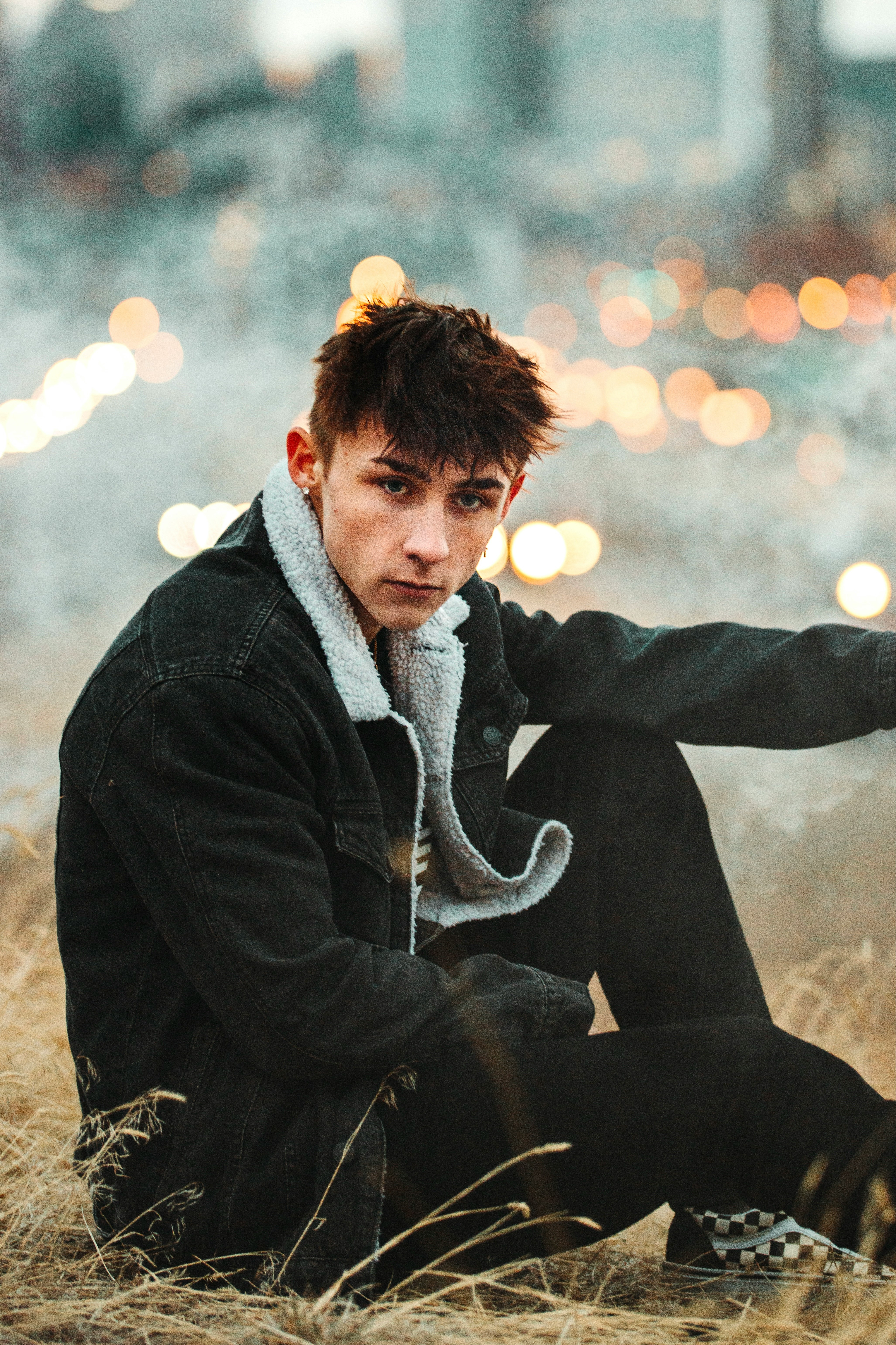 man in black jacket and gray scarf